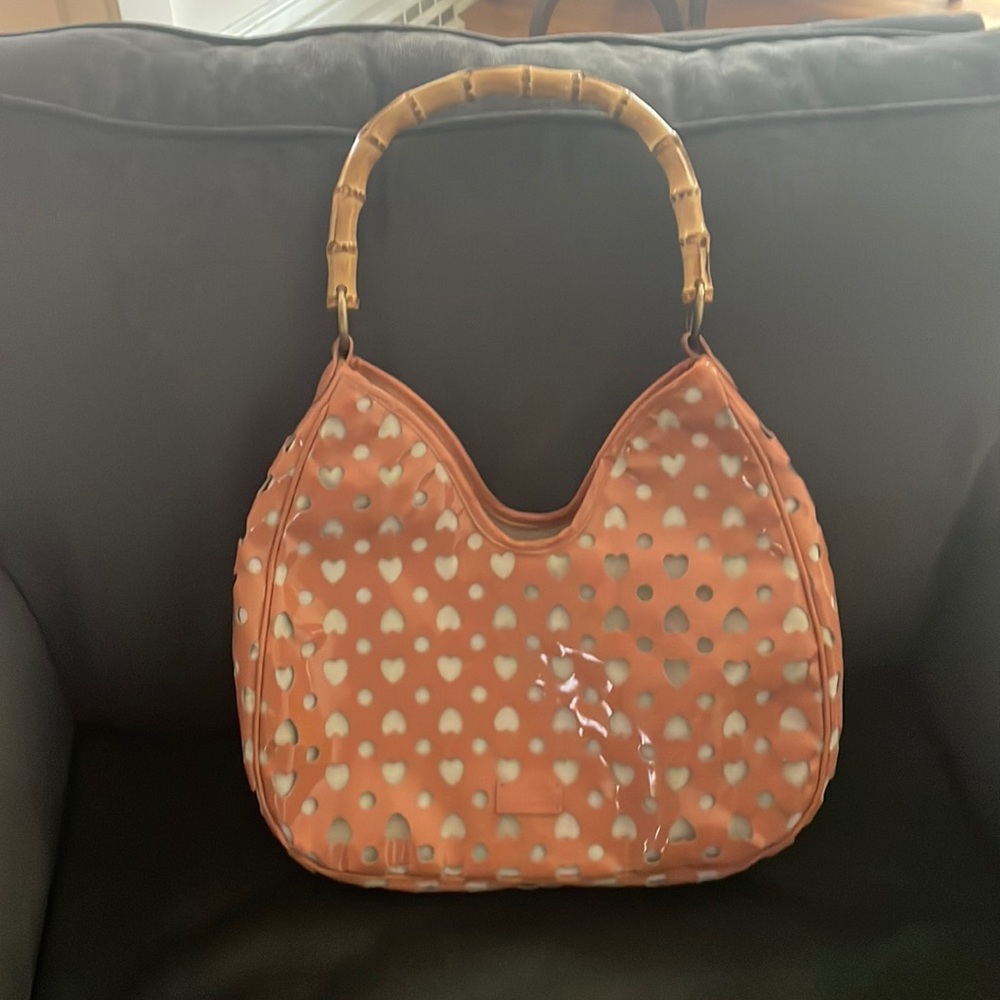 Moschino heart purse with wooden handle. Very good condition Hardly used